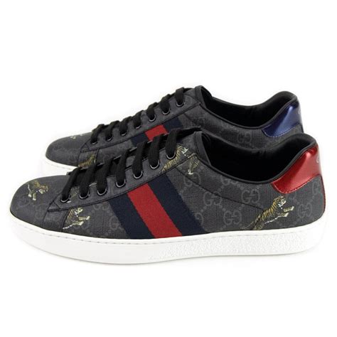 gucci black tiger trainers|black gucci sneakers for men.